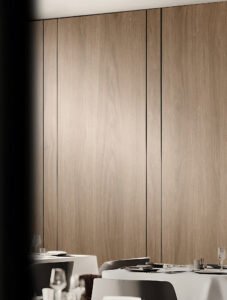 there is a table with a white table cloth and place settings